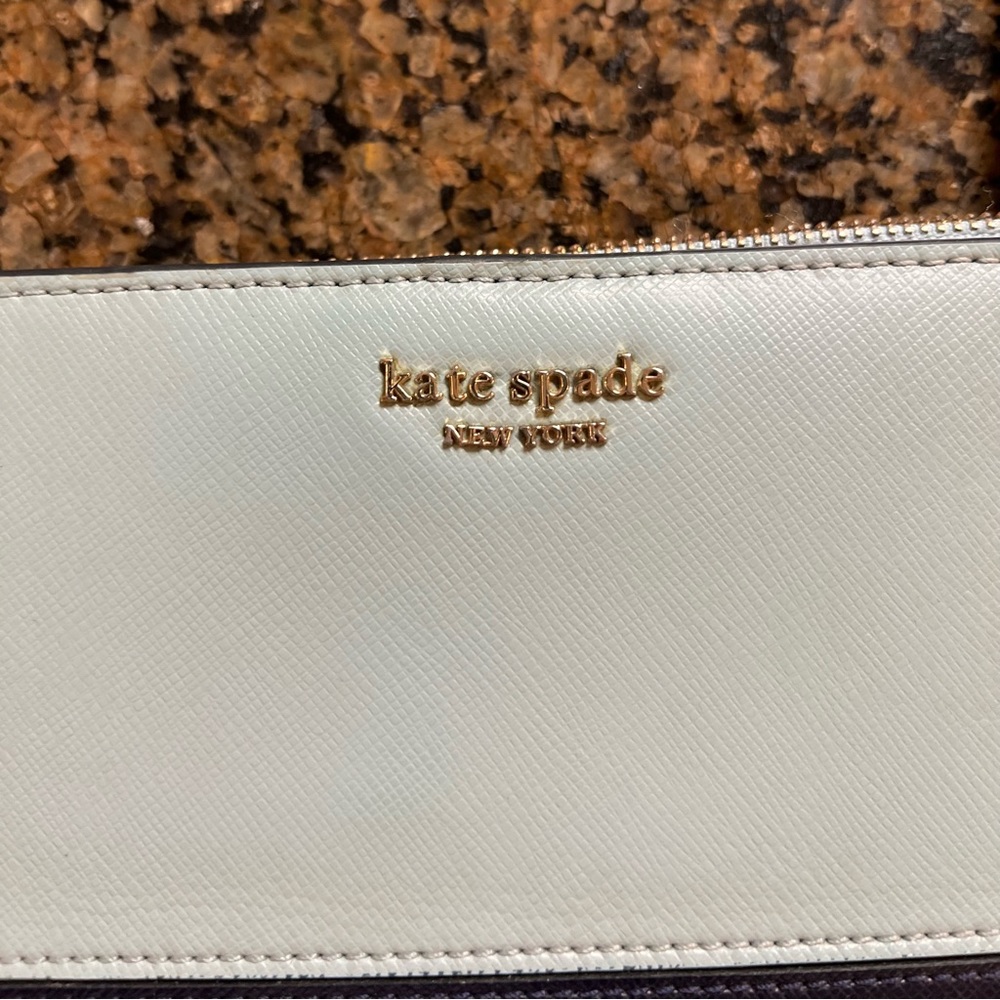 Kate Spade ♠️ wristlet wallet. Navy blue/light blue. Used but in great shape.